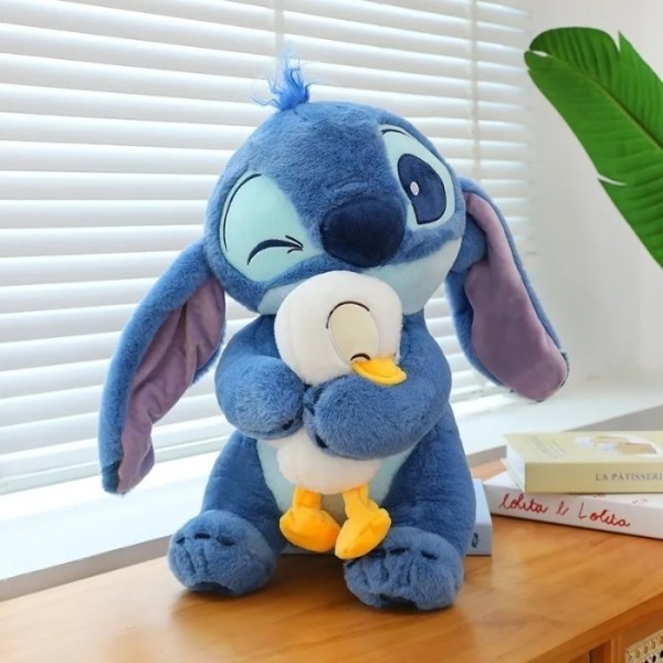 Фото - М'яка іграшка STITCH Стич з качкою 40 см (6928270764696)